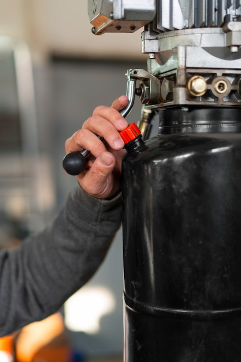 male-car-mechanic-working-car-repair-shop_23-2150367580